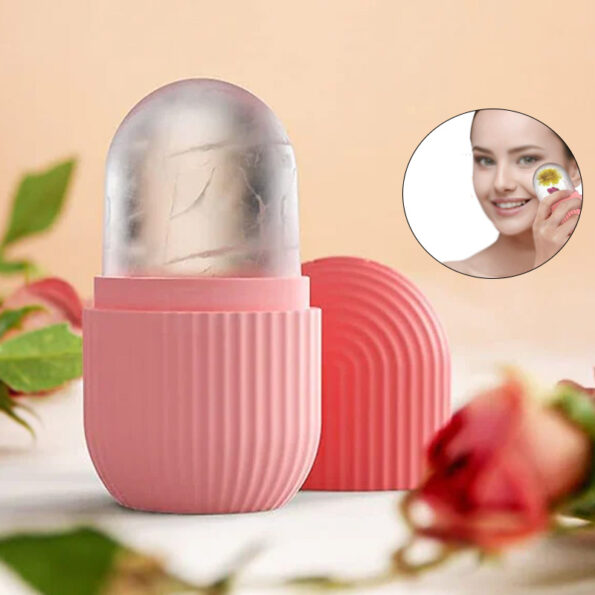 A hand massaging a cheek with a pink Silicone Face Ice Roller for a cooling skincare routine