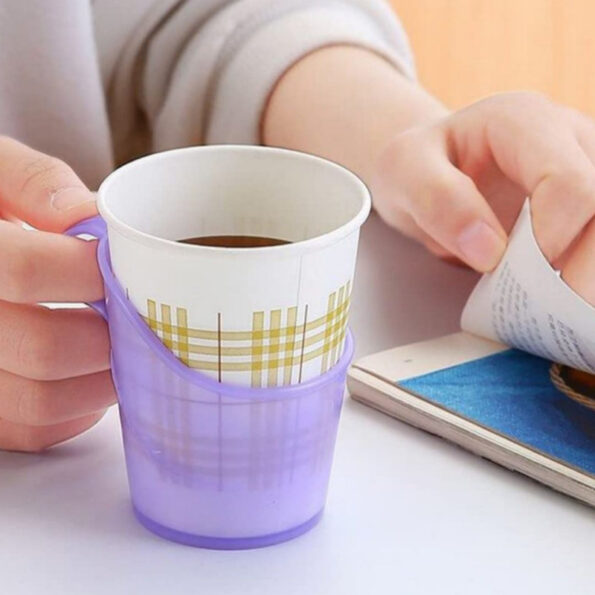A pack of six black beverage holder coffee cup holders holding multiple disposable coffee cups on a table.