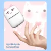 Hand holding a Portable Thermal Mini Photo Printer printing out a small black and white picture