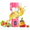 Rechargeable Travel Juicer Blender mixing fresh strawberries and bananas on a counter