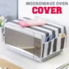 Fabric dustproof microwave oven cover with side storage pockets holding kitchen utensils