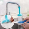 Chrome 360 rotatable water saving faucet sprayer tap attachment mounted on a kitchen sink tap
