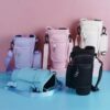 Pastel pink aesthetic 40oz tumbler carrier bag with phone pocket and adjustable crossbody strap
