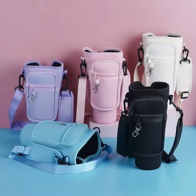 2026/07/1002078564.jpg Pastel pink aesthetic 40oz tumbler carrier bag with phone pocket and adjustable crossbody strap