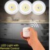 Wireless tap LED light with remote control installed under kitchen cabinet