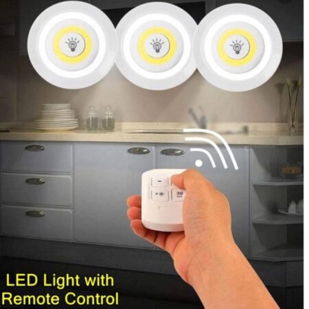 Wireless tap LED light with remote control installed under kitchen cabinet